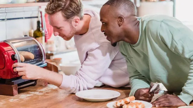 Dog owner preparing a meal