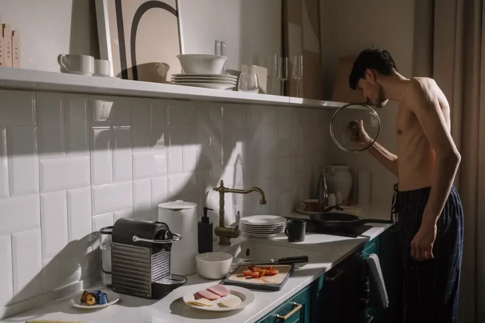 Dog owner preparing a meal