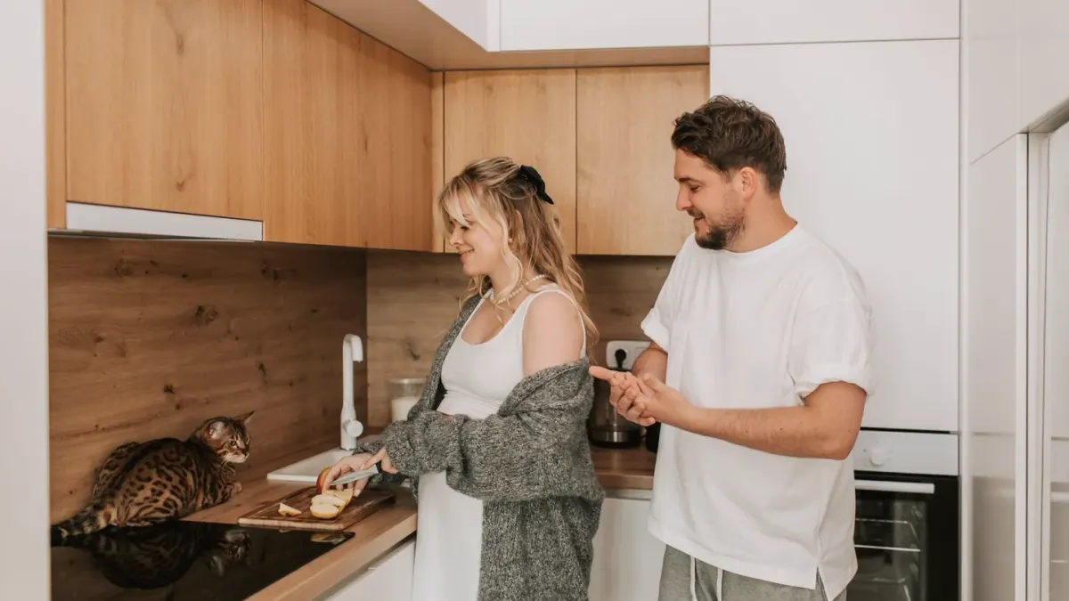 Dog owner preparing a meal