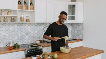 Dog owner preparing a meal